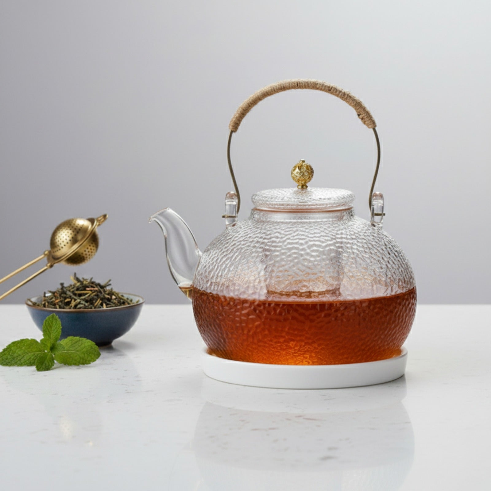Théière en Verre Épais avec Manche Cuivre - Résistante Haute Température & Poêle Céramique